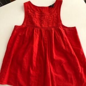 Sleeveless tomato red embroidered top